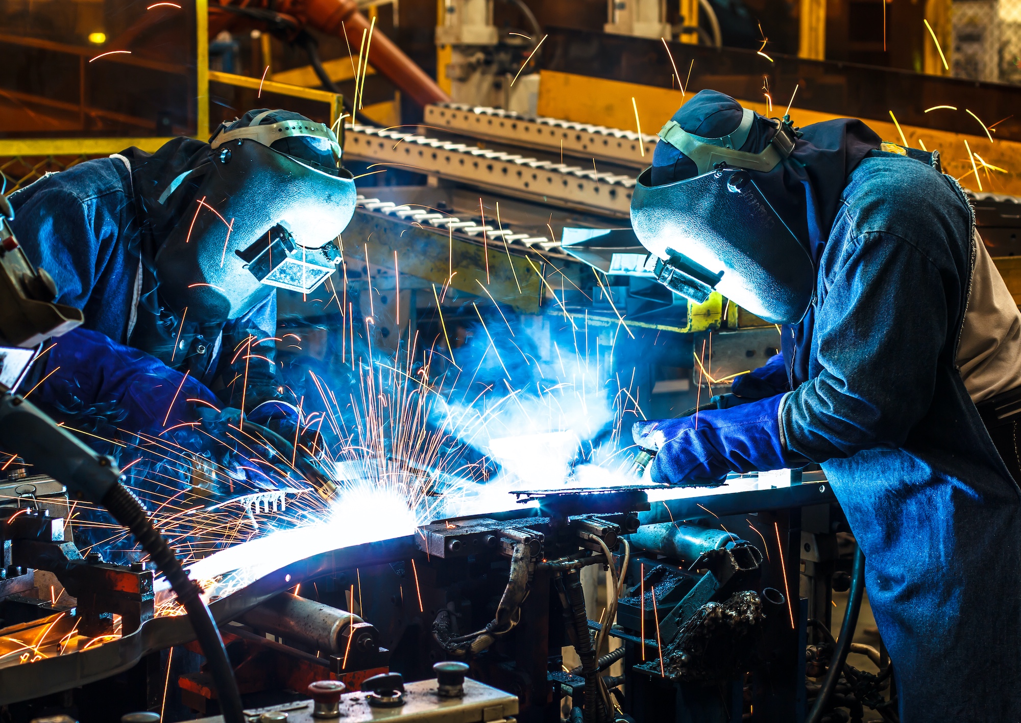 Lassers aan het werk in de productie